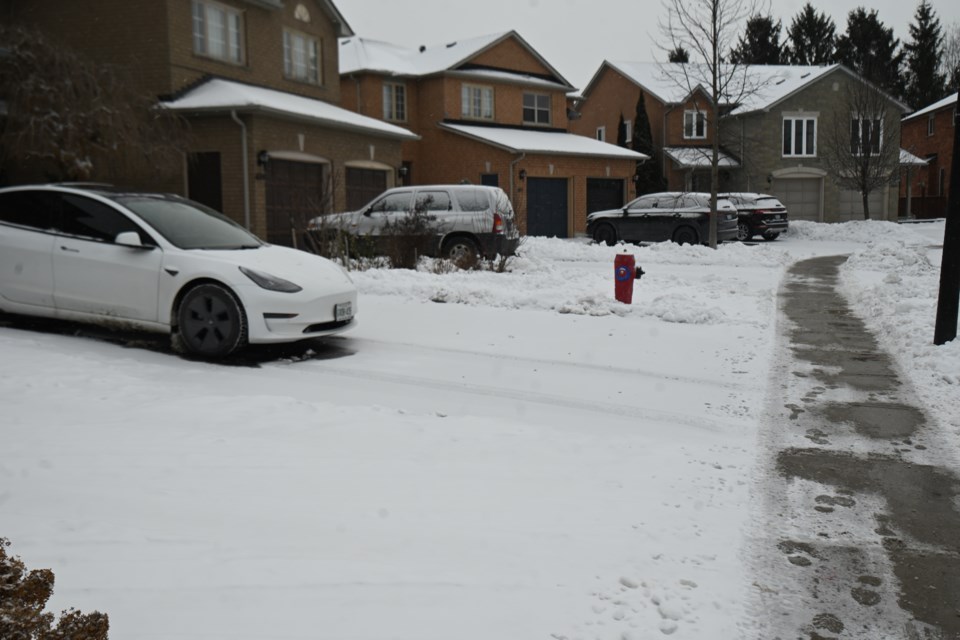 Walpole Crescent residents say their short driveways cause bylaw issues when two cars are parked in a row, as one typically protrudes over the sidewalk.