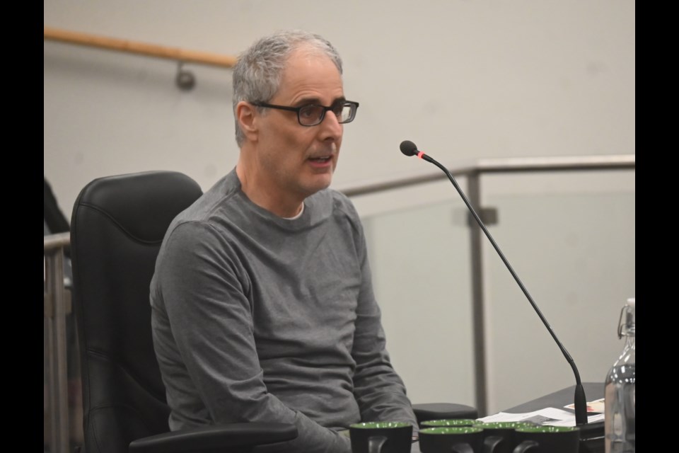 Pat Giorno raises concerns to council about an apartment proposal on Davis Drive and Bolton Avenue April 29. 