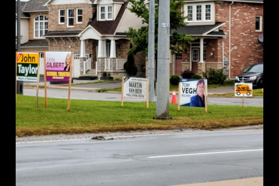 Newmarket municipal election candidates are complaining about damage and loss of their election signs. 