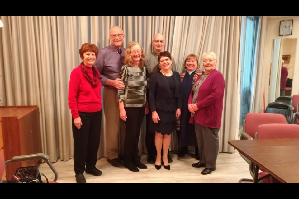 Volunteers Janet Thacker, David Hoath, Lynn Hoath, Bill Stephens, Sheila Stephens, Rev. Laura Duggan, and Adela MacDonald are shown here at St. Andrew's Presbyterian Church on Feb. 16, 2020. Julia Galt for NewmarketToday