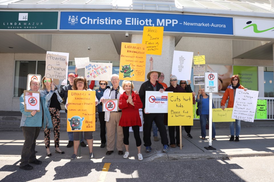Protesters gathered in front of MPP Christine Elliott's constituency office.  Greg King for NewmarketToday