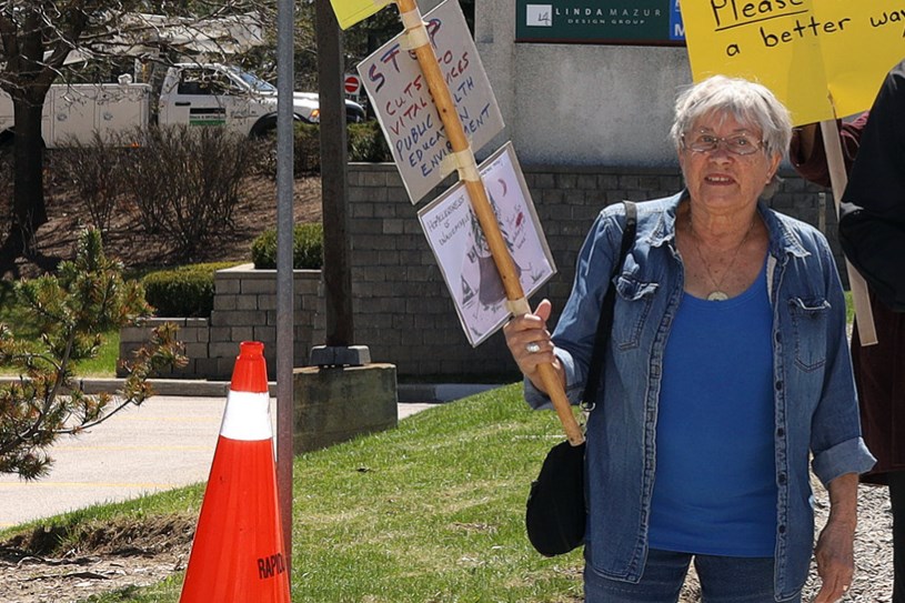 Teresa Porter is co-founder of Drawdown Newmarket-Aurora. She is shown here at a recent demonstration against provincial government funding cuts. Greg King for NewmarketToday