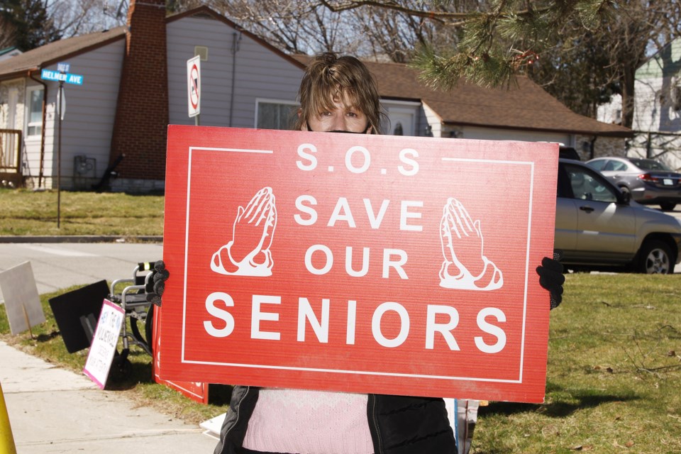 Dawn Shea advocates for seniors in long-term care at a protest at Eagle Terrace in Newmarket on Good Friday.  Greg King for NewmarketToday