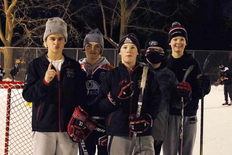 Jamal, Pegasus, Frankie, Nicky, and Ferrari were playing shinny at the Lions Park community rink earlier this month. Greg King for NewmarketToday