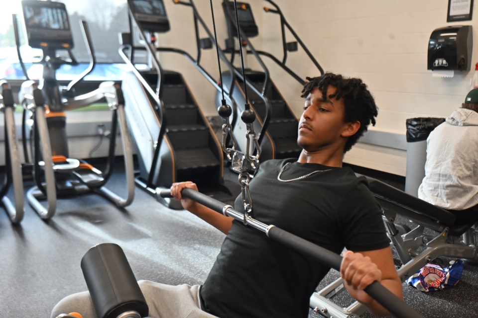 Resident Joseph Daniel uses one of the fitness machines. 