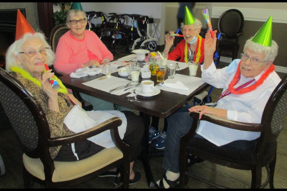 Residents at Chartwell Alexander Muir Retirement Residence during a Project Smile party.