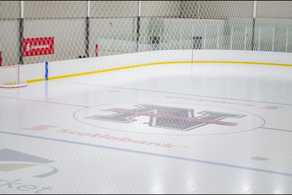 The NMHA Redmen stencil at centre ice will be replaced by next season. Dave Kramer for NewmarketToday