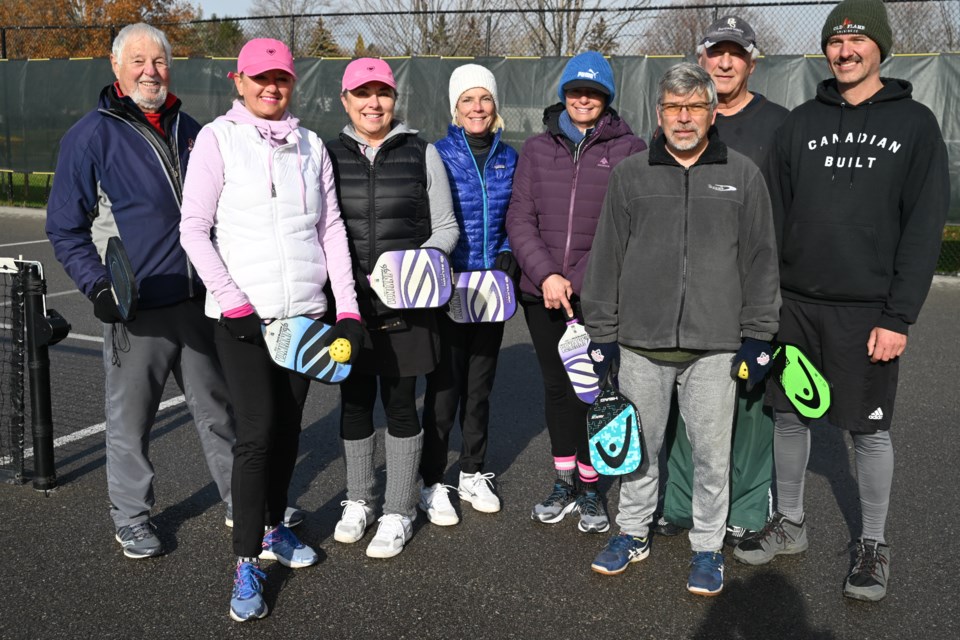 Much of the appeal of playing pickleball in Newmarket is the social aspect of the game, one expert says. In this file photo are Allan Fishman, Caroline Novinic, Helen Minchopoulos, Allison Kallio, Diana Dezorzi, Tony Van Krieken, Stuart Leigh, Darren Wood.