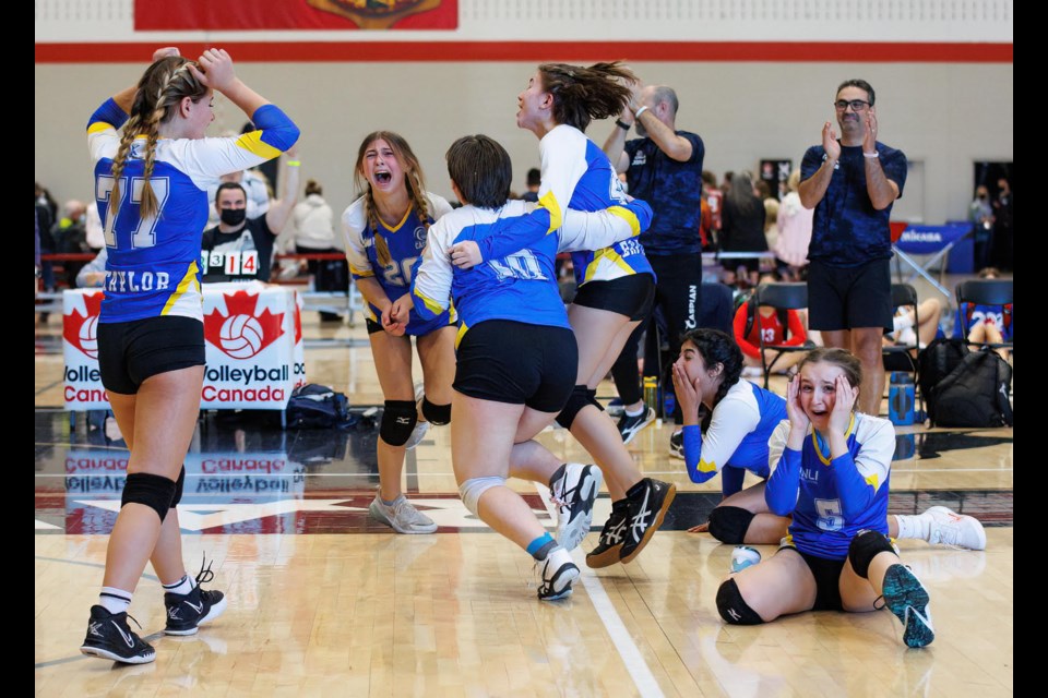 The Capsian U14 girls volleyball team celebrates after a big win at the Ottawa nationals in May. 