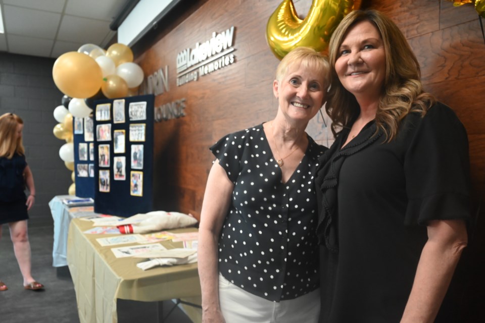 Newmarket Skating Club coach Ann Broughton (left), with former student Kim Proctor, was honoured for 50 years of coaching May 29.