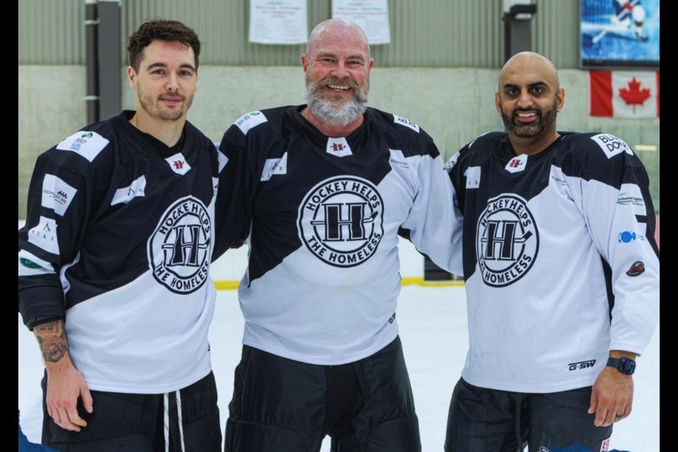 Blue Door CEO Michael Braithwaite (centre) plays in the York Region Hockey Helps the Homeless tournament, returning to  Newmarket Dec. 15, in support of Blue Door and 360kids.