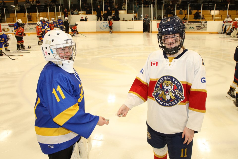 Players enjoy a tournament tradition: exchanging team pins. The prestigious Silver Stick girls tournament hosted by the Central York Panthers returns to Newmarket and Aurora this weekend with 60 teams from across North America.