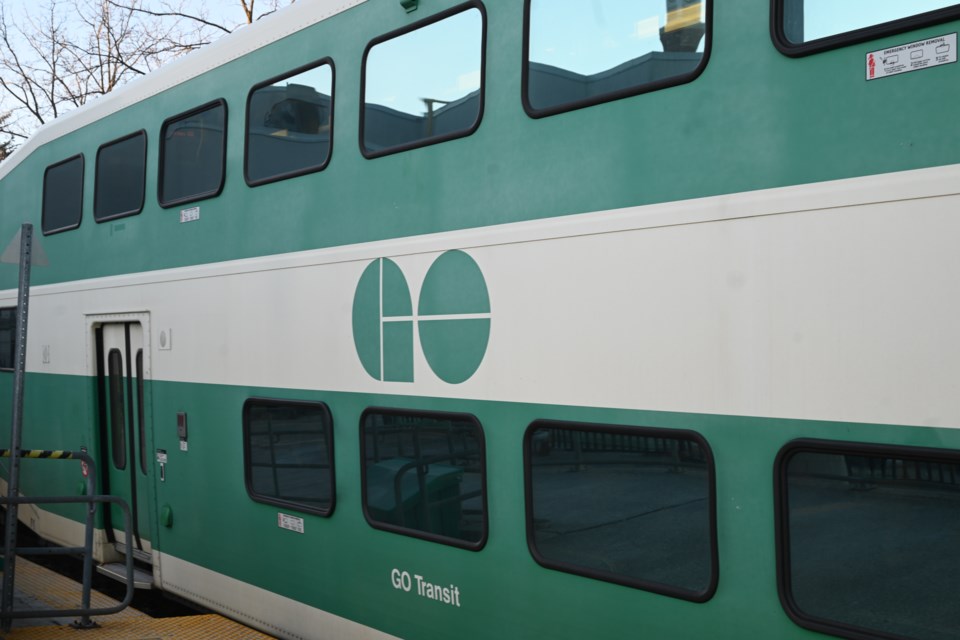 A train sets out from the Newmarket GO station. 