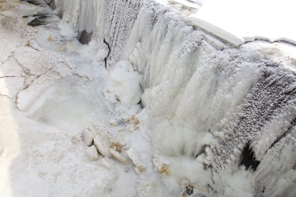 The ice on Fairy Lake is not solid and is moving, here some of it has gone over the falls.
