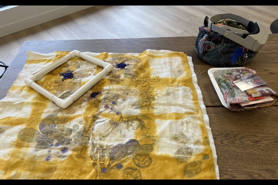 The show includes eco-printed fabrics, handwoven tapestries, quilted wall hangings, intricate bead work on textiles and more.