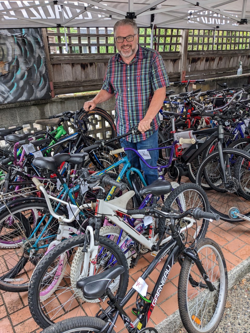 2023-06-16-gordon-with-donated-bikes