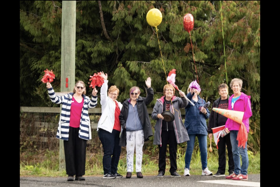 At Solidarity Cycle fundraiser, participants will be cheered on by members of New West's Royal City Gogos.