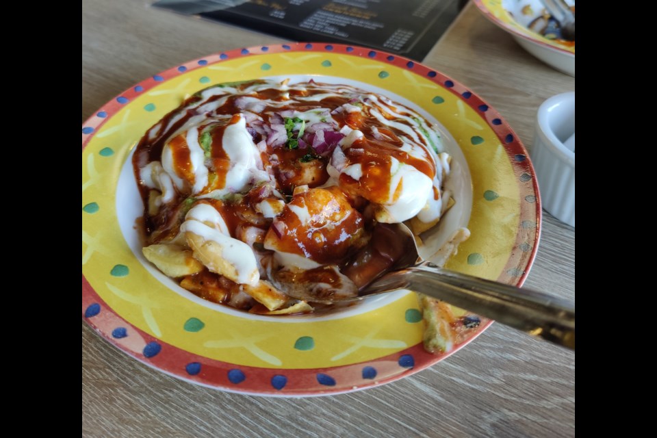 Dahi papdi chaat, a street food that includes wheat crackers, gram flour noodles and a mix of chutneys, is on the menu at the new eatery.