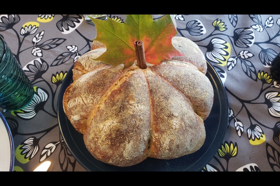 "The breads are baked first at 240C for 20 minutes, then for a further 20 minutes at 220C. Ideally in a Dutch oven or something similar with a lid (I use a big enamel roasting pan). Lid is removed after the first 20 minutes," said Marlowe. Once the bread is baked, the twines can be removed; Marlowe pokes in a cinnamon stick to look like the stem, and ta-da! The pumpkin-shaped bread is ready to be served.
