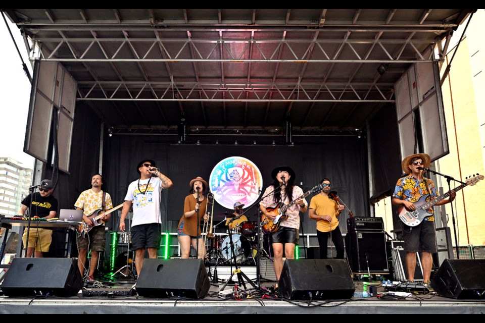 Latin Alternative 8-piece band MNGWA perform on the main stage during the TD Uptown Live Street Party on July 15, 2023. Photo: Jennifer Gauthier