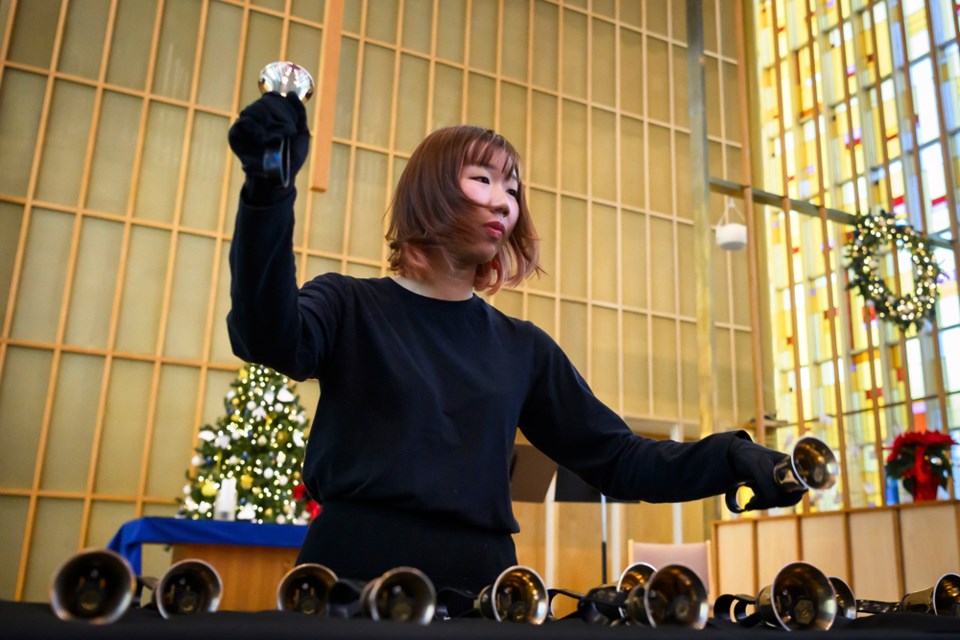 Solo ringer Jaimie Lam performs at Carols and Bells. 