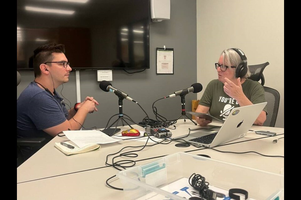 Something to say? Community members Daniel Huespe and Jennifer Nathan, who attend the library’s monthly Podcast Meetup, check out the library's new podcast service space. photo New Westminster Public Library