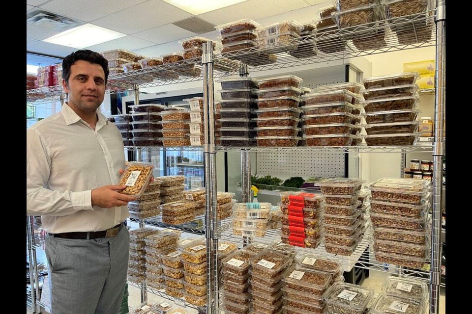 Owner of the new Persian Baanou Supermarket, Meisam Karami, is also a professor at Ascenda School of Management in Vancouver. Photo: Naveena Vijayan 