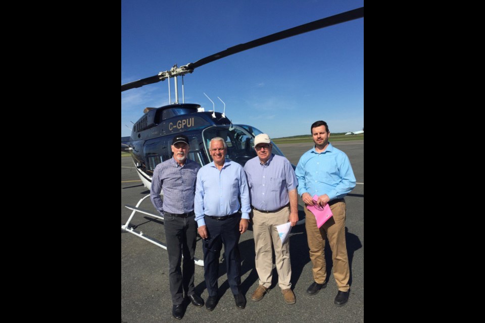 (l-r) Noront Resources president-CEO Al Coutts and his vice-president of mining and projects Steve Flewelling joined Greater Sudbury Development Corporation business development officers Paul Reid and Jean-Mathieu Chénier for some aerial reconnaissance over Sudbury on June 13 to scan brownfield sites for a ferrochrome smelter. 