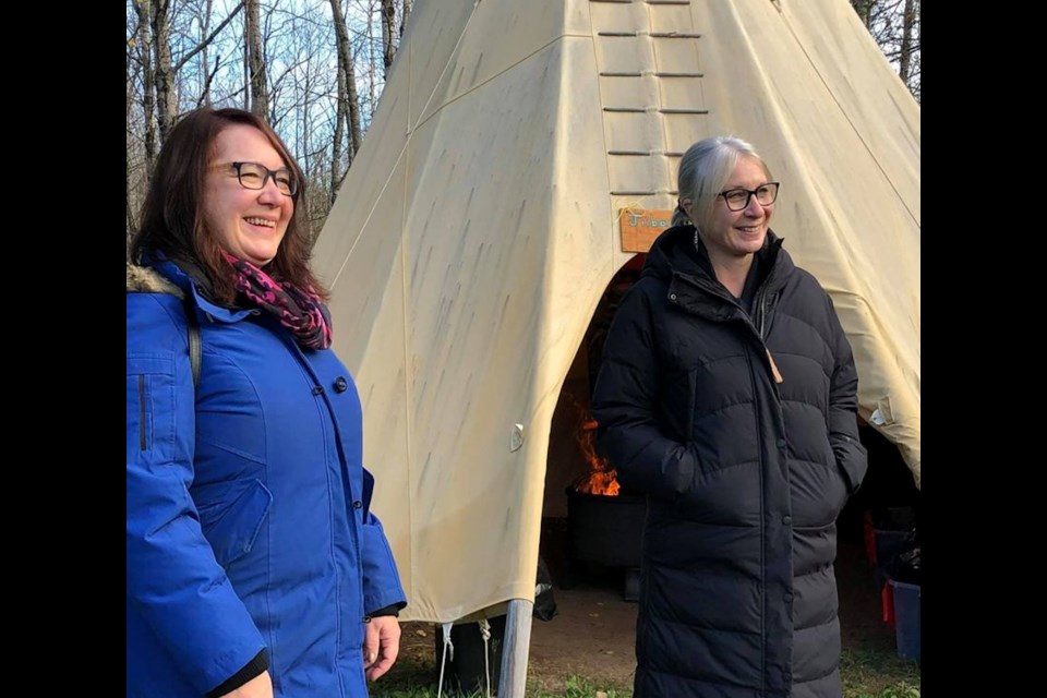 Cora McGuire-Cyrette (left) of the Ontario Native Women's Association with federal cabinet minister Patty Hajdu. 