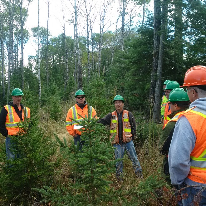 EACOM's Andrew Duizer, Marc Trottier, and Mike Forrest in the field