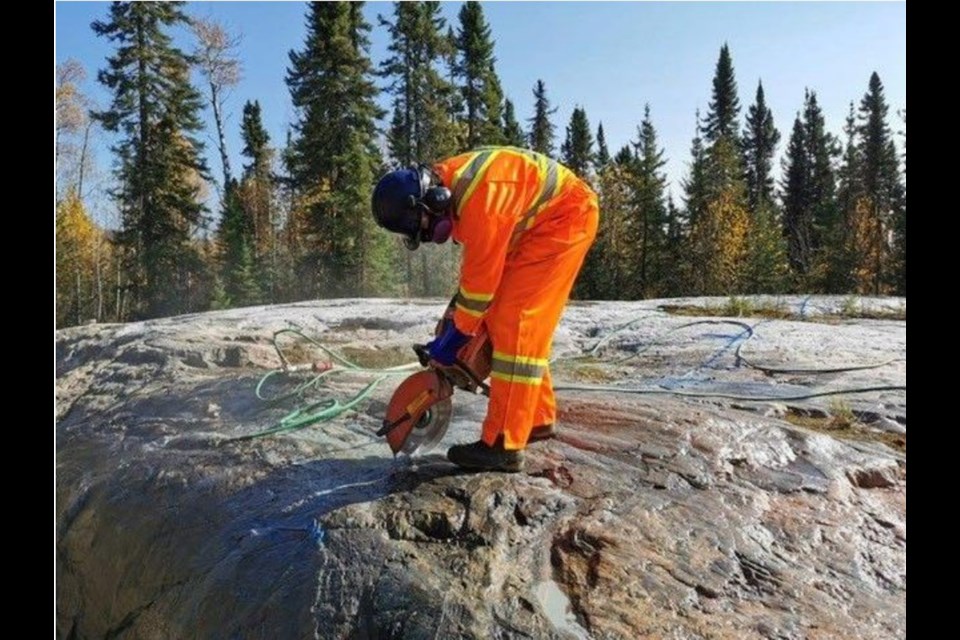 A channel sample being cut at Green Technology Metals' Seymour Project last fall (Company photo)