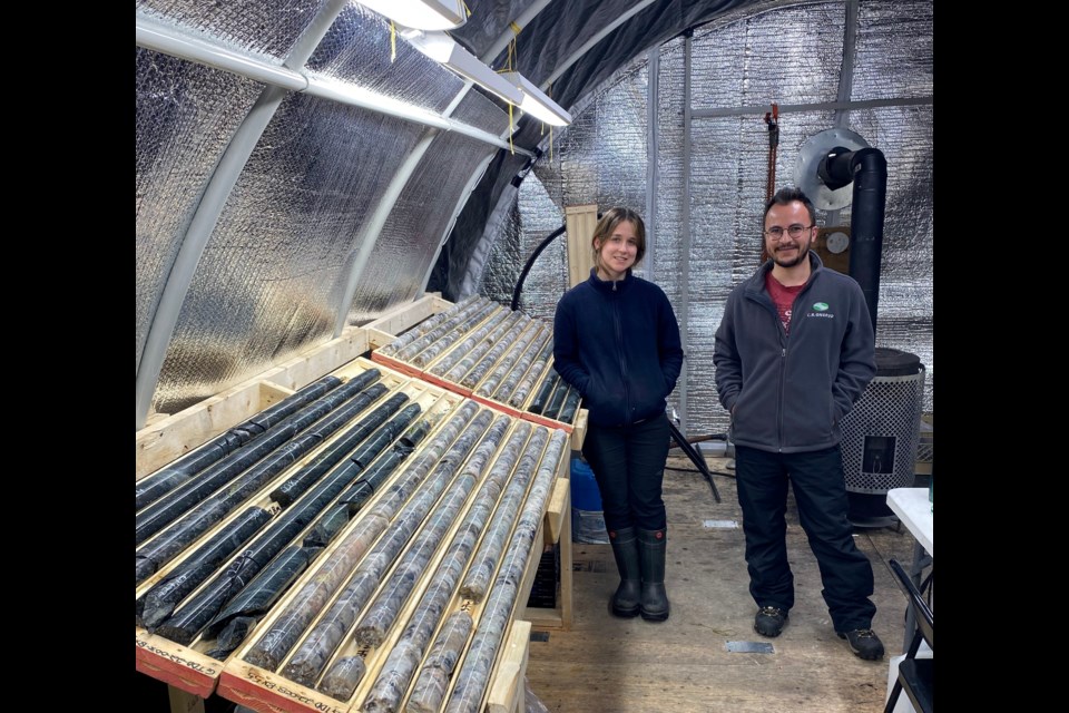 Geologists examining drill core at Green Technology Metals' Seymour Project (Company photo)