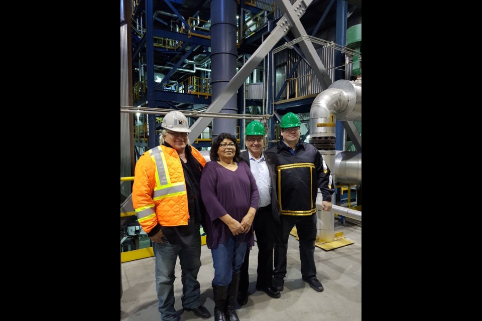 Chief Keith Corston of the Chapleau Cree First Nation, Chief Johanna Desmoulin of the Netamisakomik Anishinabek (Pic Mobert First Nation, Frank Dottori, President and CEO of Hornepayne Lumber and Hornepayne Power Inc., and Chief Jason Gauthier of the Missanabie Cree First Nation,  tour the Hornepayne co-gen facility.  (Nadine Robinson photo)
