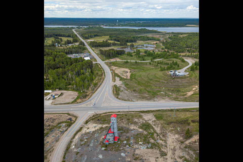 The intersection of Highways 11 and  584 leading into Geraldton, years prior to the start of mine construction. The Macleod-Cockshutt headframe is in the foreground (Premier Gold photo)
