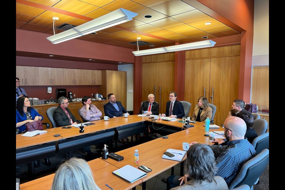 Federal Natural Resources Minister Jonathan Wilkinson, flanked by Nickel Belt MP Marc Serré and Sudbury MP Viviane Lapointe, speaks to the Greater Sudbury Chamber of Commerce members on March 1. (Supplied)
