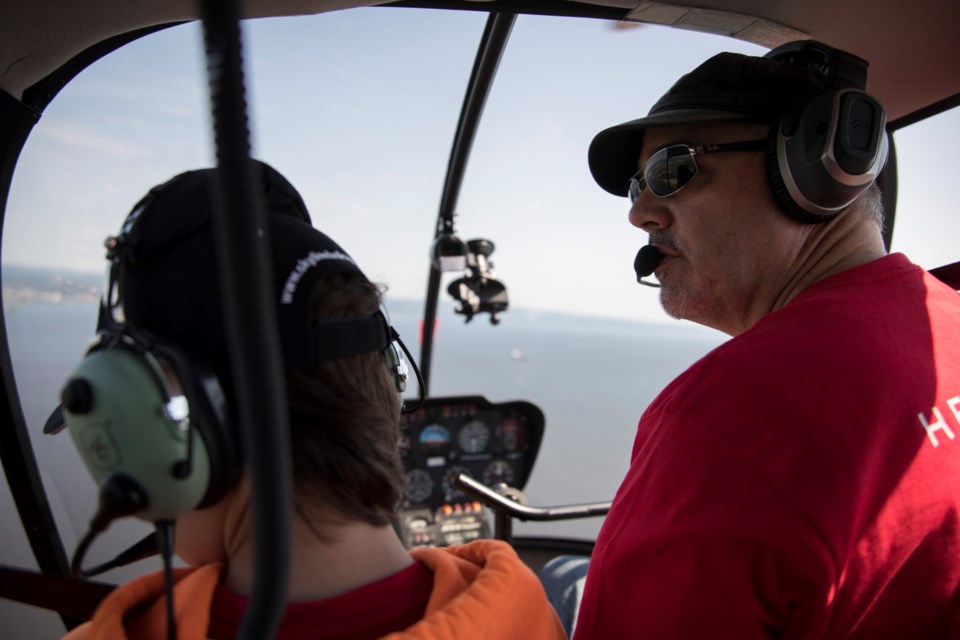 Helicopter pilot Liam Dowds is ready to take tourists and business travellers aloft this summer with a new touring company coming to Thunder Bay’s waterfront. (Photos courtesy of Damien Gilbert/Epica Pictures)