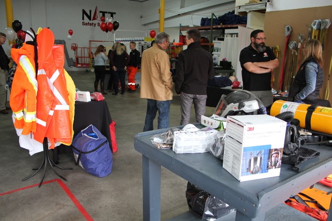 Members of the public and well-wishers packed the office of NATT Safety Services to celebrate the official grand opening in Lively in October, which included demonstrations of confined space rescues, looking over equipment they use, touring parts of the facility and talking to staff.