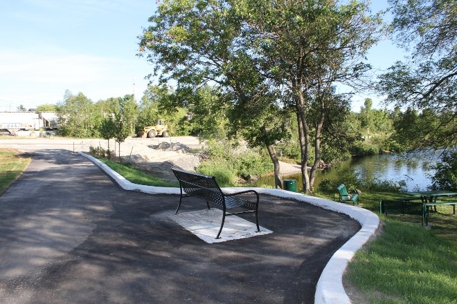 In Capreol, on the south end of Lakeshore Street, is a seating area and picnic tables, as well as the start of a paved walkway along Vermillion River. All of which are part of the $1.8 million in improvements to the riverfront to attract visitors.