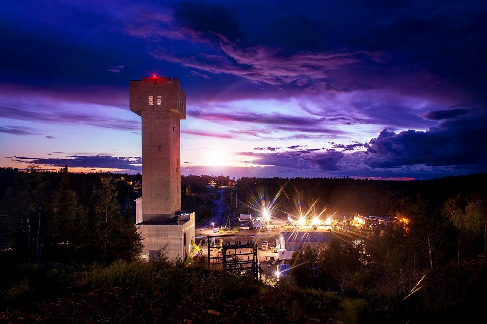 Pure Gold Mine headframe at night