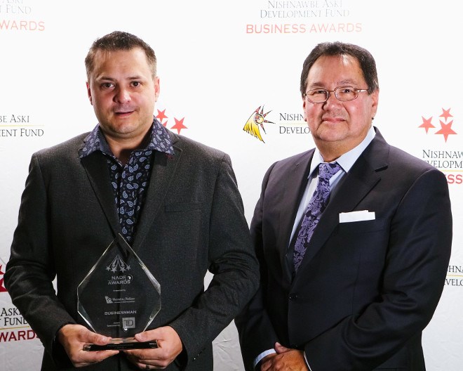 The Businessman of the Year Award was presented to Pete Beaucage Jr. of Praztek Construction (left) by Brian Davey, executive director of the NADF. (Supplied photo)