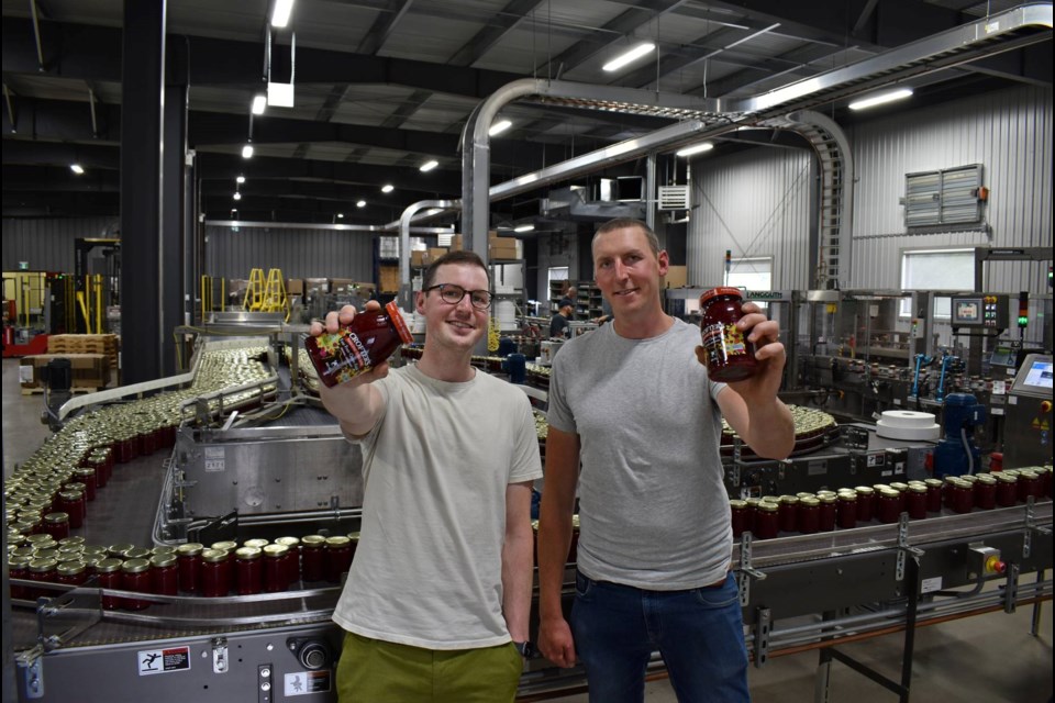 Sebastian Latka (left) and his brother, Dan Latka, are the second generation to work in the family business. Crofter's Organic makes a variety of organic fruit spreads at its manufacturing facility near Parry Sound.