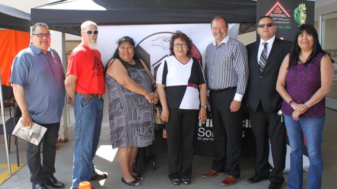 On July 19, Whapmagoostui First Nation announced a new building partnership, Helping Homes, with SuperSHELL Homes. In North Bay for the announcement were (from left) Brian Wynne, Whapmagoostui housing manager; Ross MacLean, co-owner of SuperSHELL Homes; Hannah Kawapit, Whapmagoostui treasurer; Whapmagoostui  Chief Louisa Wynne; North Bay Mayor Al McDonald; Robert Wynne, Whapmagoostui director of operations; and Linda Job, project liaison. Lindsay Kelly photos