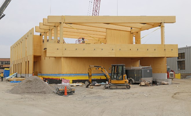 Mass timber construction uses engineered wood products such as cross-laminated timber and glue-laminated timber to build larger structures. (Ontario Wood WORKS! photo)