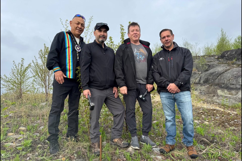 Construction on the new Jijaak Waazhimoonegen-Teg Technica Mining Advanced Training Centre kicked off in May with a copper rod ceremony. Pictured, from left, are: Vance Nootchtai, Gimaa Craig Nootchtai, Mike Teddy, and Mario Grossi.
