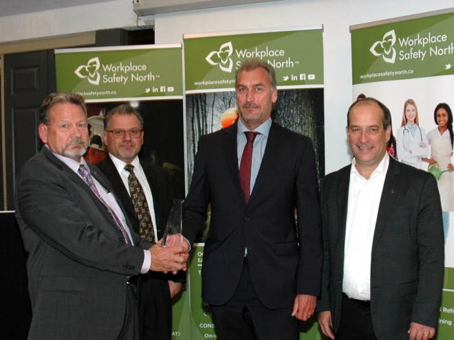 Workplace Safety North President’s Award winner for Ontario mining sector: DeBeers Group of Companies - Victor Mine, northern Ontario 90 km west of Attawapiskat; left to right: Michael Jordan (DeBeers), Sam Barbuto (WSN), Alistair Skinner (DeBeers), and Paul Andre (WSN). (Supplied photo)