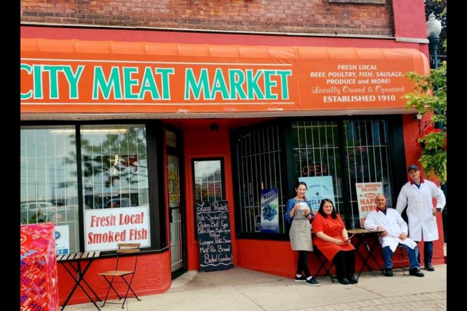 City Meat Market's partners pause for a photo outside the downtown Sault Ste. Marie store. From left are Lori Nowitski, Rosina Bruni, John Bruni and Jamie Elliott.