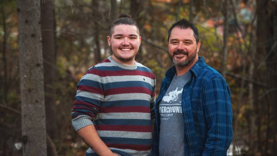 Jeff Lafortune (right) and his son, Connor, design mining-themed T-shirts through their company, My Mining Tee. They're hoping their T-shirts will spark conversations about trades work and its importance to the mining industry.