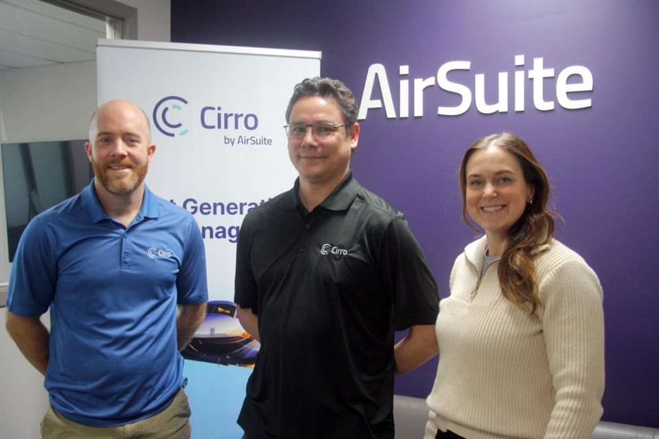 From left are co-founders Doug Carlson and Michael Kleywegt, and Kim Latimer, the company's communications director.