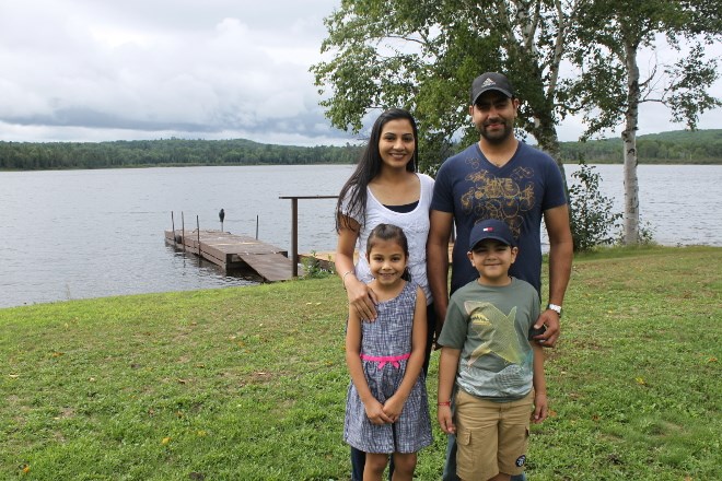 Gary and Nav Bath, along with their children Kul and Aikan, acquired the Welcome Inn, just outside Mattawa, in 2017. They had never before lived outside the GTA, but the couple say the peaceful and friendly town has been very welcoming. (Lindsay Kelly photo)