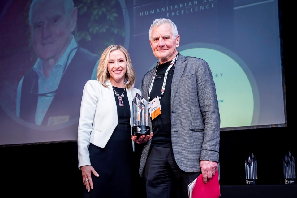 Water Tower Inn founder J.J. Hilsinger (right) receiving the 2020 Humanitarian of the Year Award from the Hotel Association of Canada. | Supplied photo